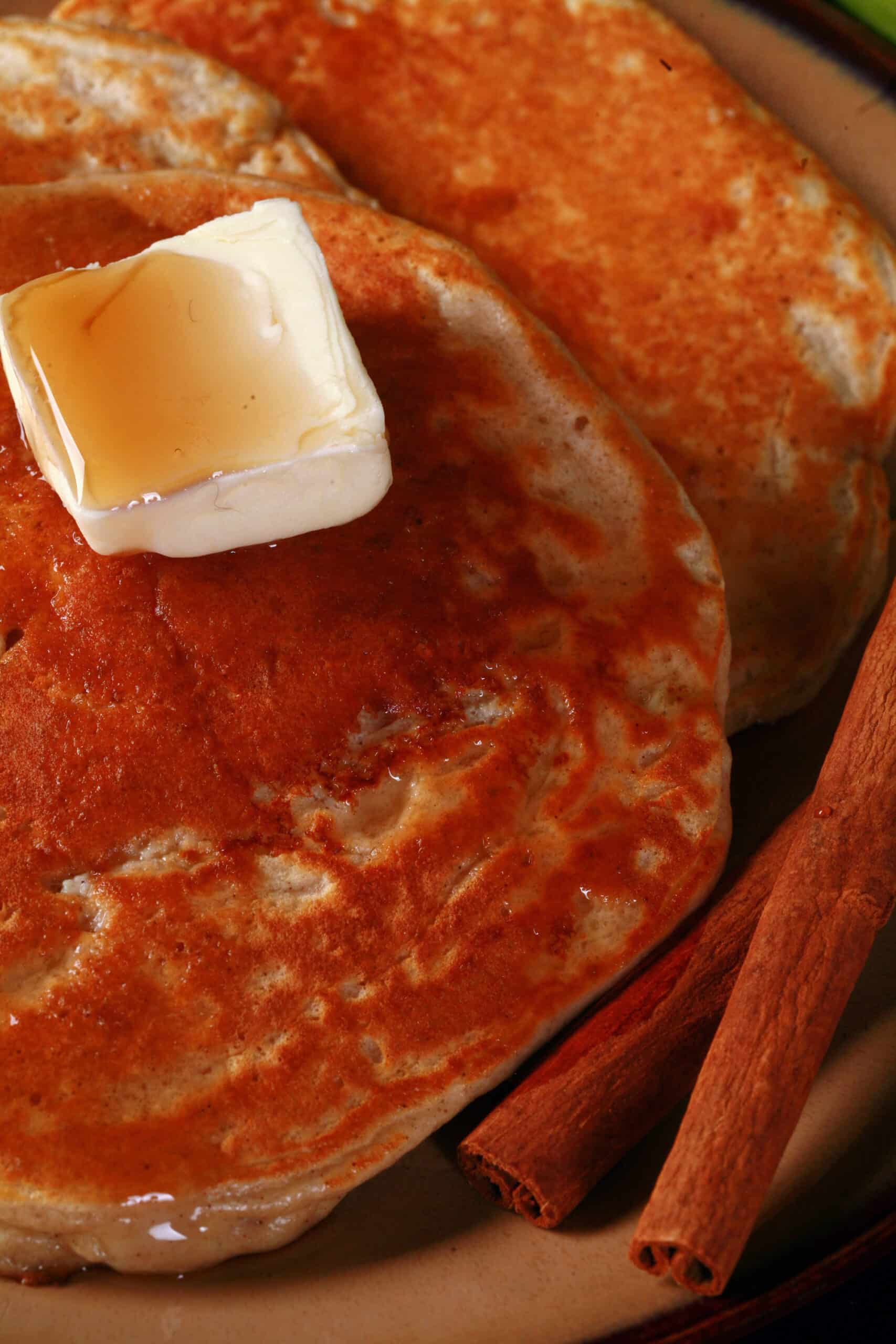A plate of cinnamon apple protein powder pancakes.