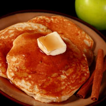 A plate of apple cinnamon protein pancakes.