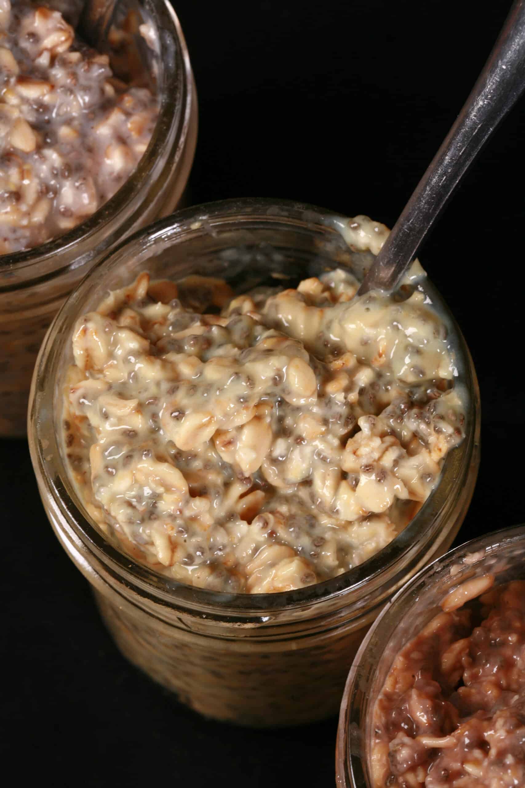 3 jars of different flavours of protein powder overnight oats.