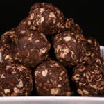 A bowl of chocolate peanut butter protein balls.