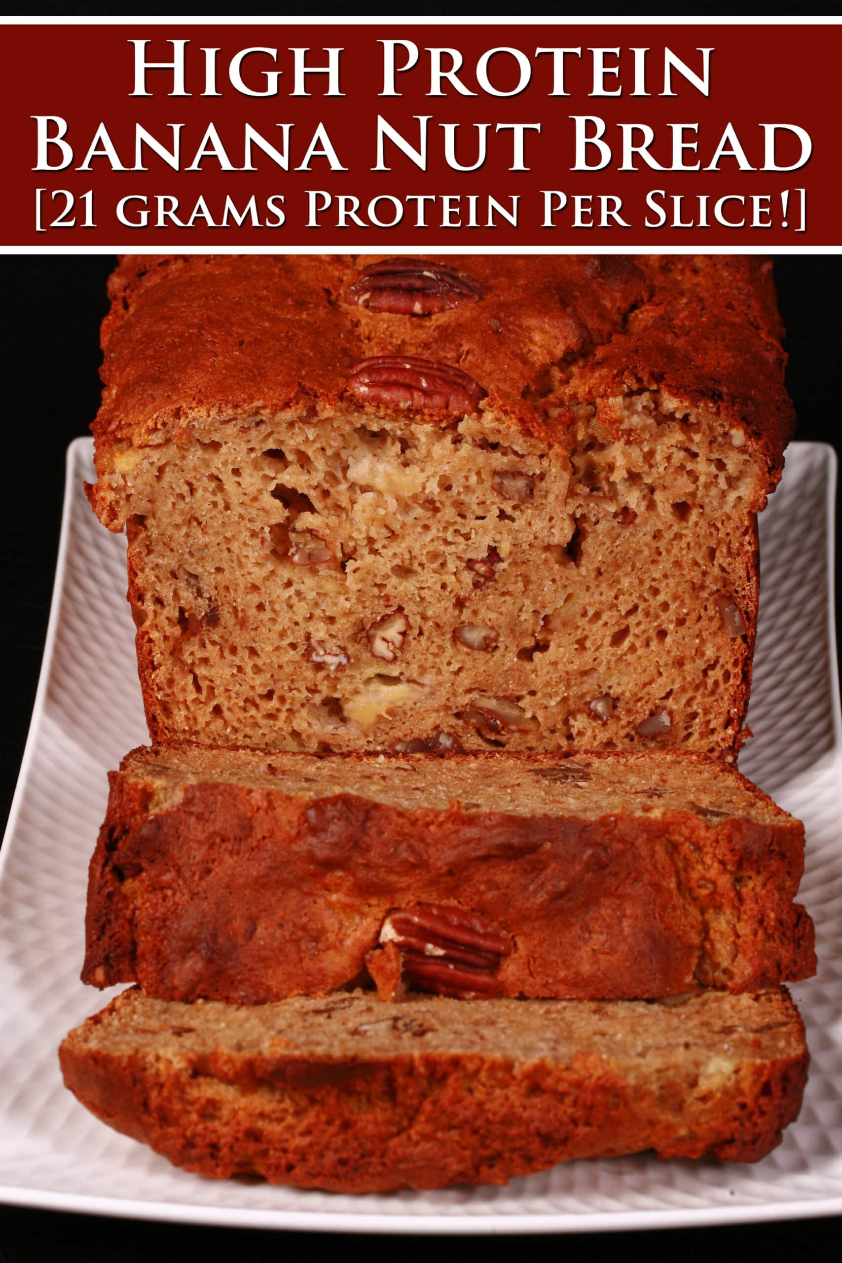 A sliced loaf of gluten free high protein banana bread on a white plate. Overlaid text says high protein banana nut bread 21 grams protein per slice.