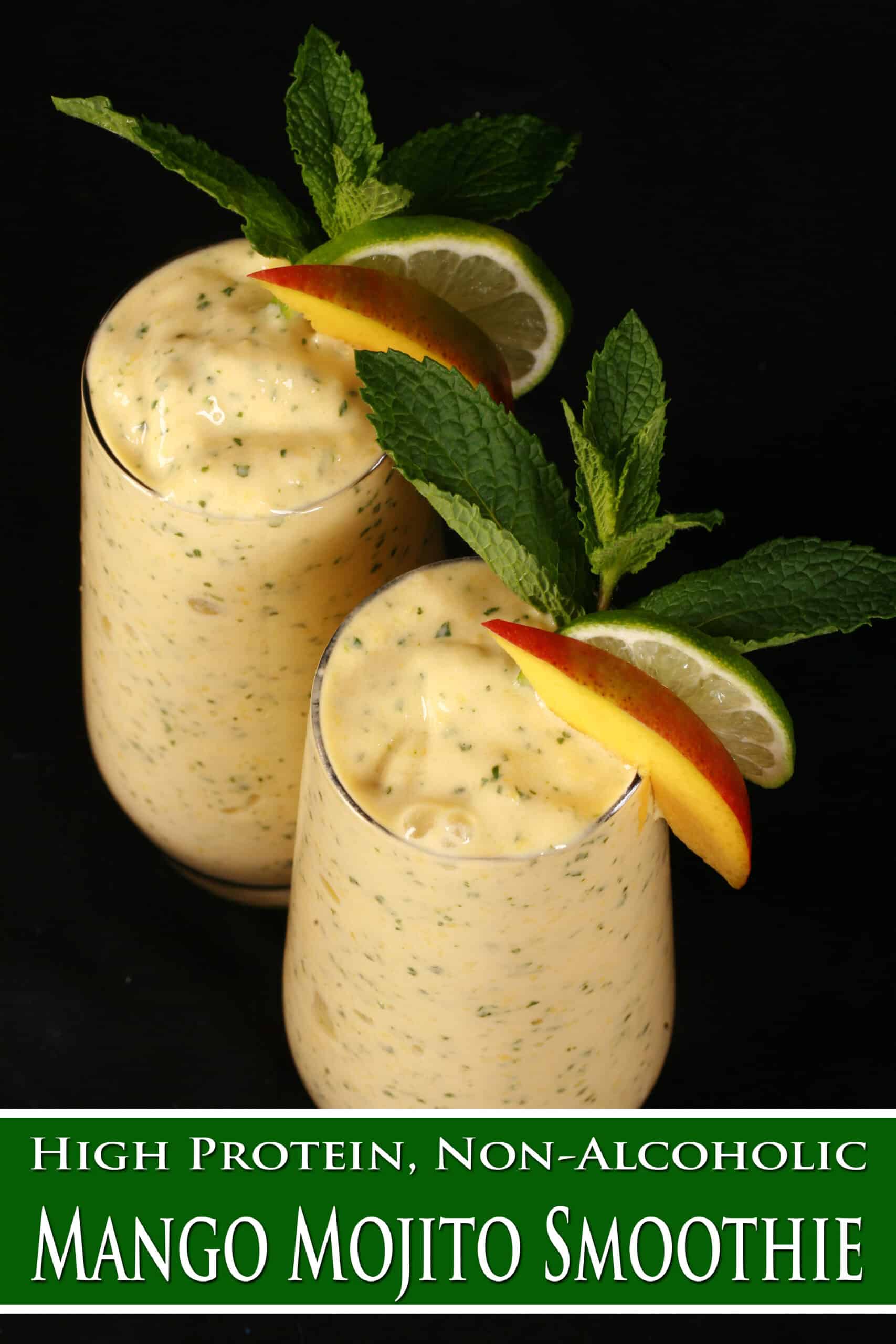 2 mango mojito protein smoothies, garnished with fresh mango and lime slices and a mint sprig. Overlaid text says high protein non alcoholic mango mojito smoothie.