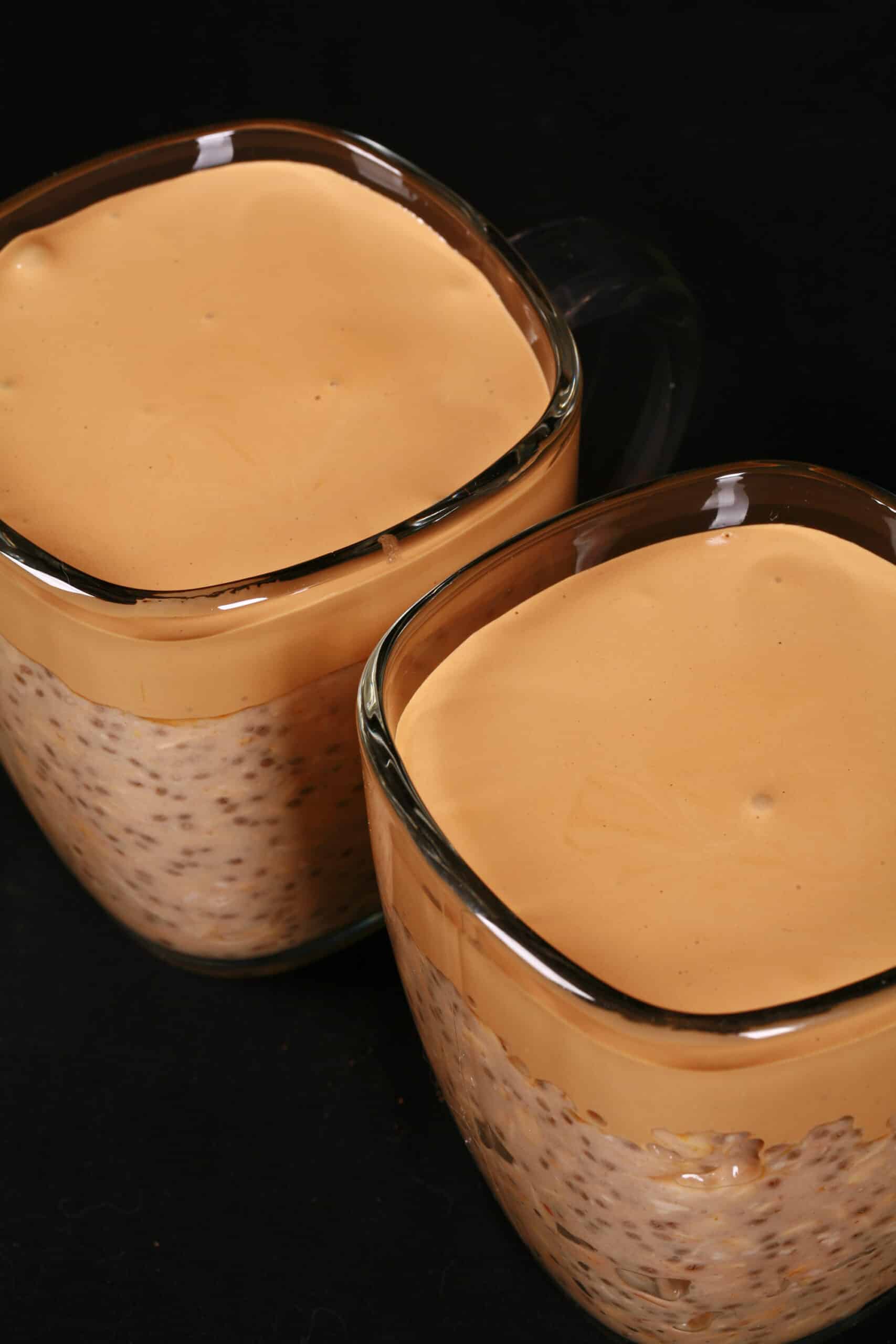 2 mugs of High Protein Dalgona Coffee Overnight Oats.