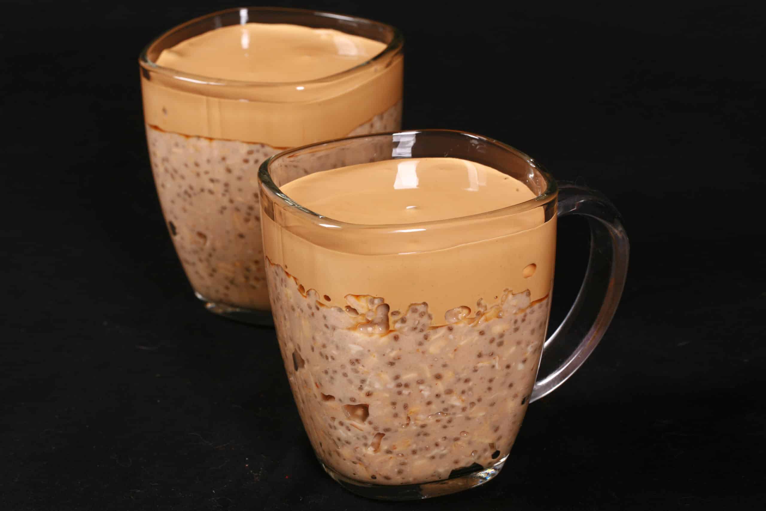 2 mugs of High Protein Dalgona Coffee Overnight Oats.