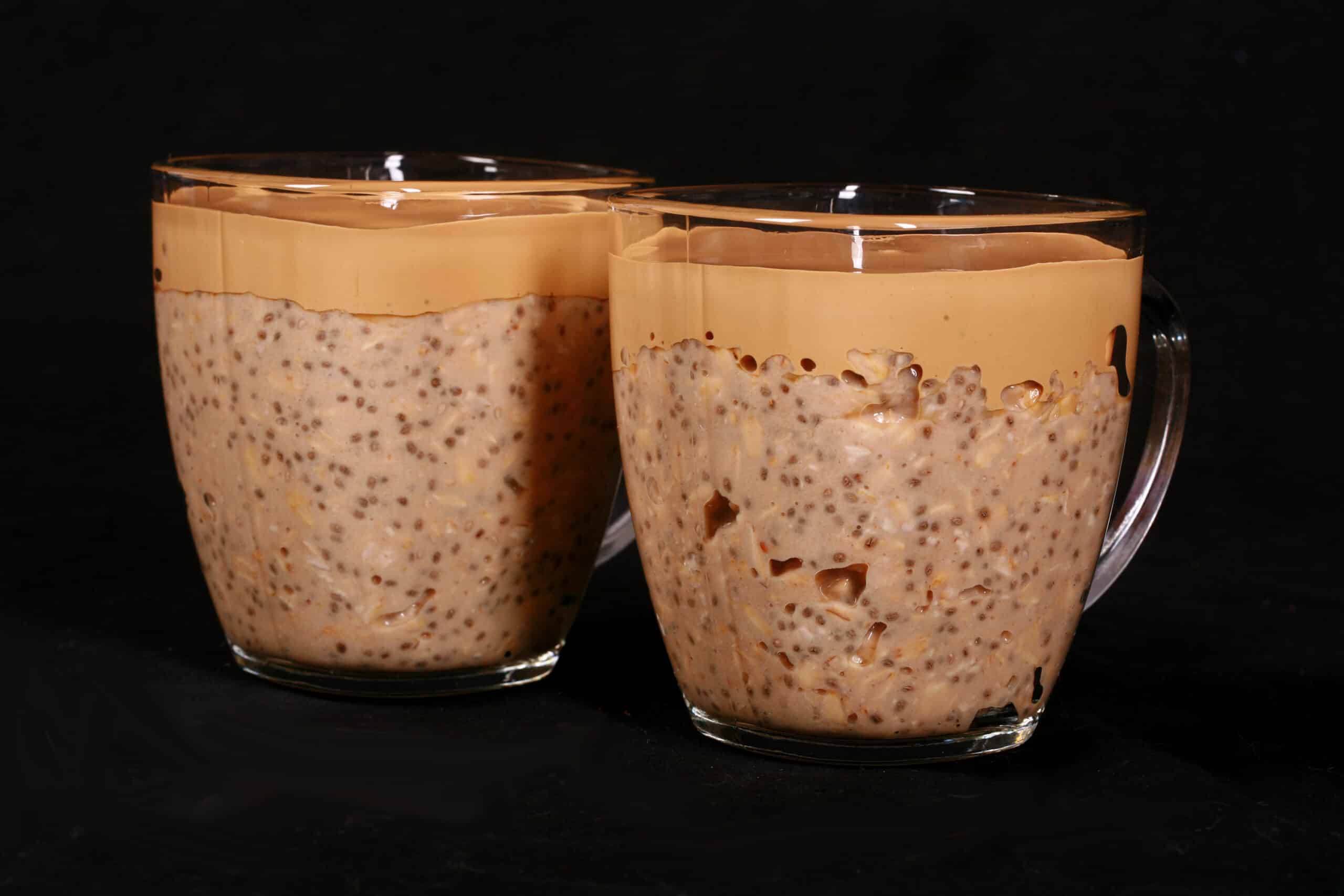 2 mugs of High Protein Dalgona Coffee Overnight Oats.